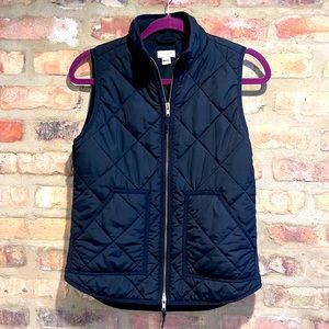 J. Crew black quilted vest.